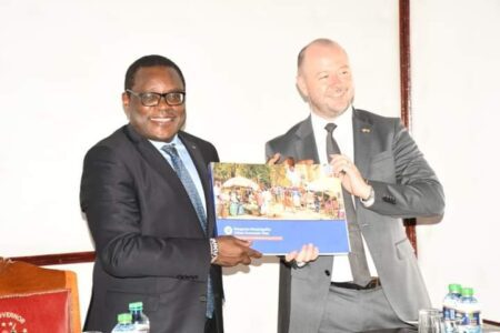 Bungoma Governor Kenneth Lusaka (left) with British High Commission Economic Counselor and Head of Section, Mike Foster during the event. PHOTO/GLPU
